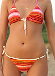 Tanned teen nudist flashing on seaside