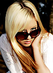 Ashley relaxes in the sun at a public park