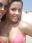 Kaley flashes a little nipple on the beach