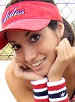 Skinny cutie funs on a tennis court